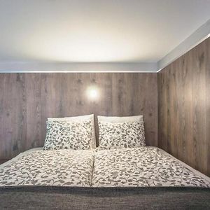 Kamer met een Queen Size Bed